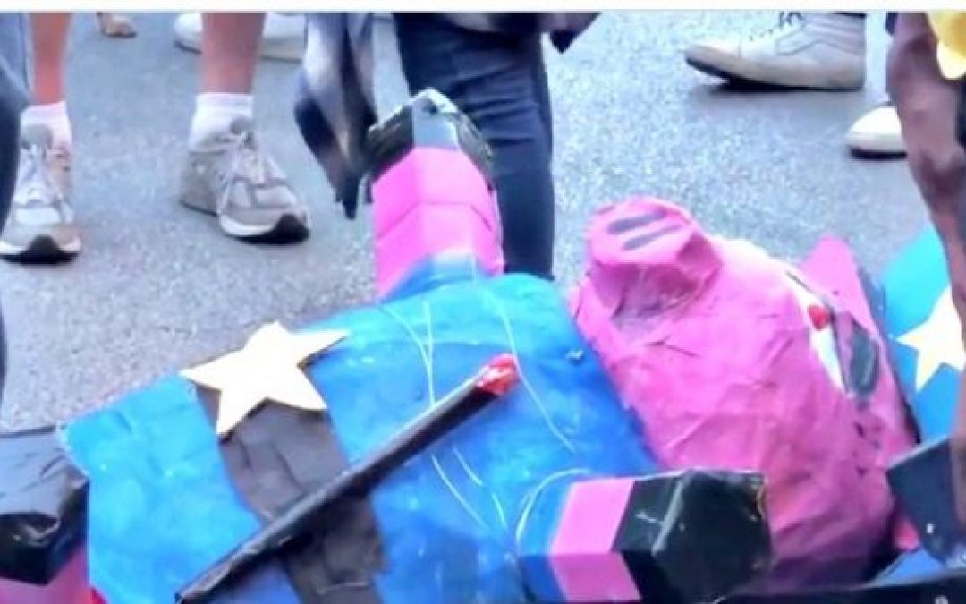 BLM Dance Around Severed Heads of Piñata Pigs Symbolizing The Police (Videos)