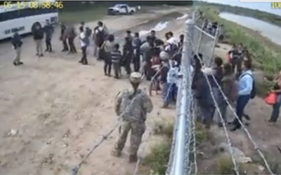 US Soldier Caught  Helping illegals Through Fence Into Texas