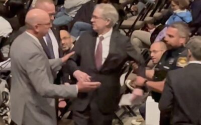 Why Was An Investor Arrested At A Shareholder Meeting For Asking Warren Buffett Questions About Jeffery Epstein?